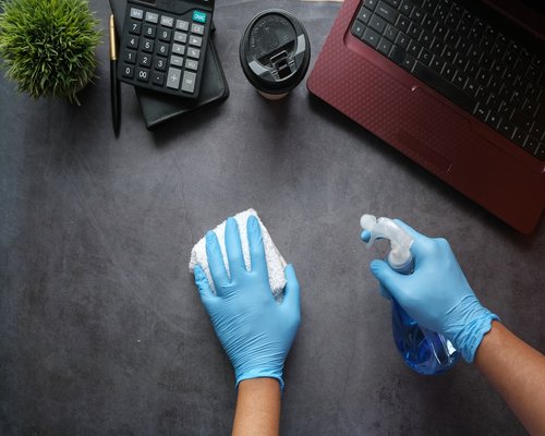A clean workspace desk showing contact and collaboration concept